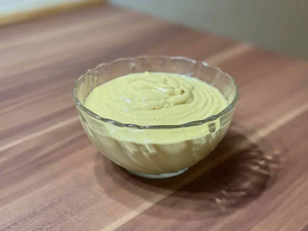 Cashew sauce in a small bowl.